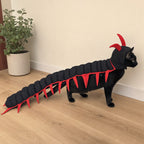 Black cat modeling adjustable centipede costume from side with long fabric legs